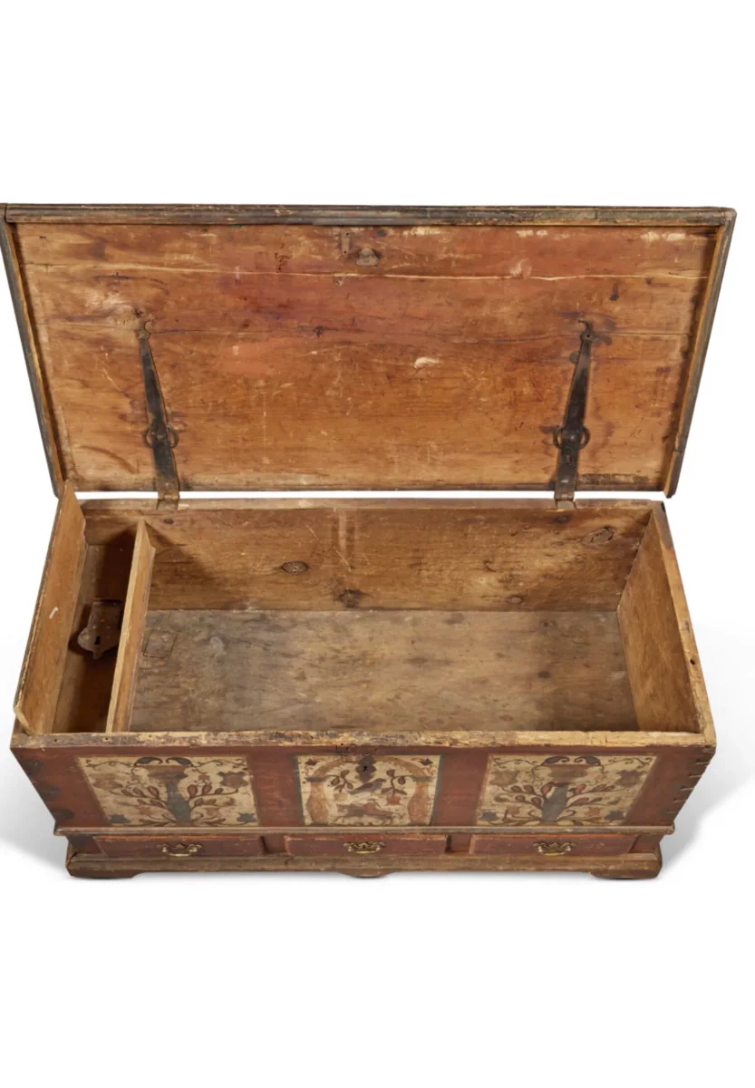 Open Pennsylvania German painted chest showing the interior, hinged lid, till compartment, and iron hardware
