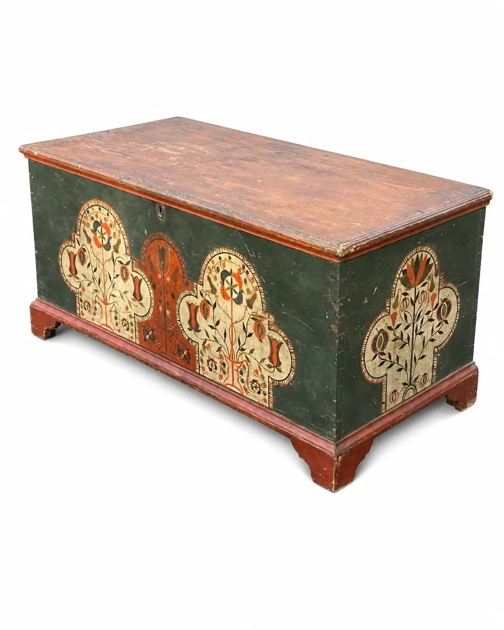 Green-painted folk-art blanket chest with floral decoration and red bracket base isolated on a white background